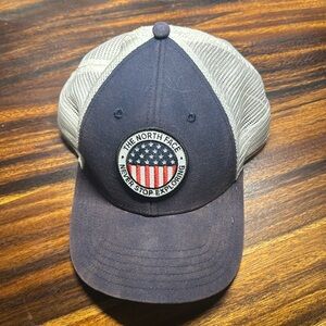 The North Face SnapBack “Never Stop Exploring” American Flag
